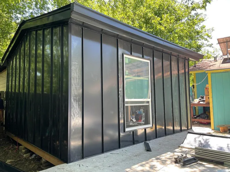 Black standing seam metal wall panels for Roof Inspection in Panama City Beach