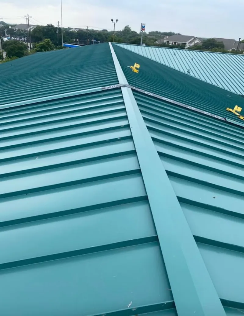 Green commercial metal roof ridge and valley for Metal Roof Repair in Panama City Beach